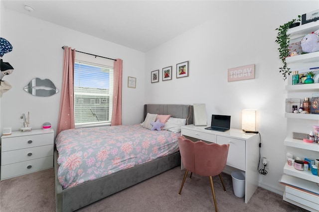 bedroom with light colored carpet