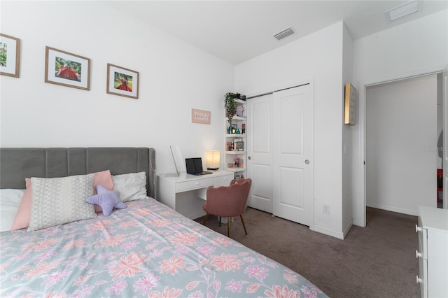 bedroom with a closet and carpet