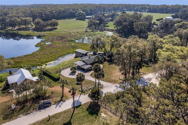 aerial view featuring a rural view and a water view