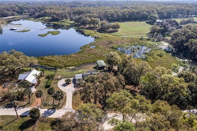 aerial view with a rural view and a water view