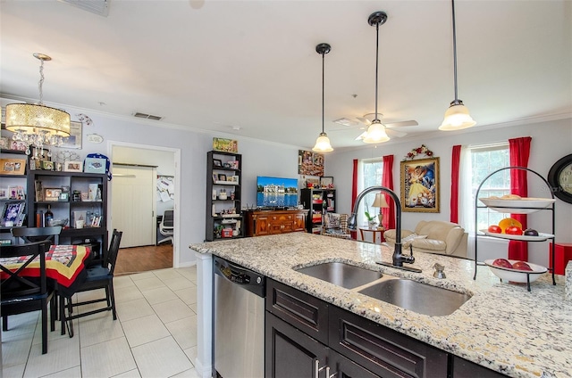 kitchen with crown molding, visible vents, stainless steel dishwasher, open floor plan, and a sink