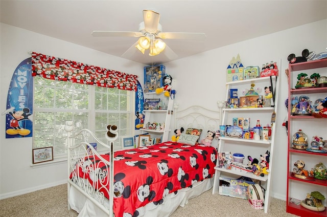 bedroom with carpet floors, ceiling fan, and baseboards