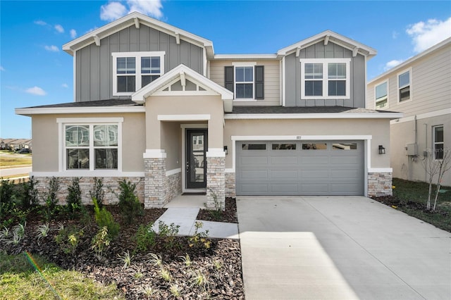 craftsman inspired home with a garage