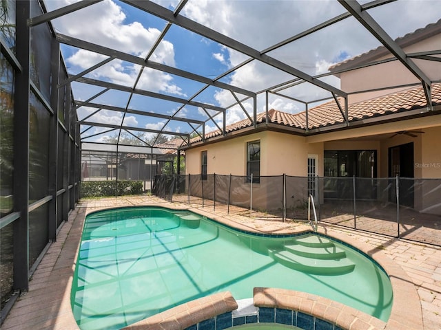 view of pool featuring a patio area and a lanai