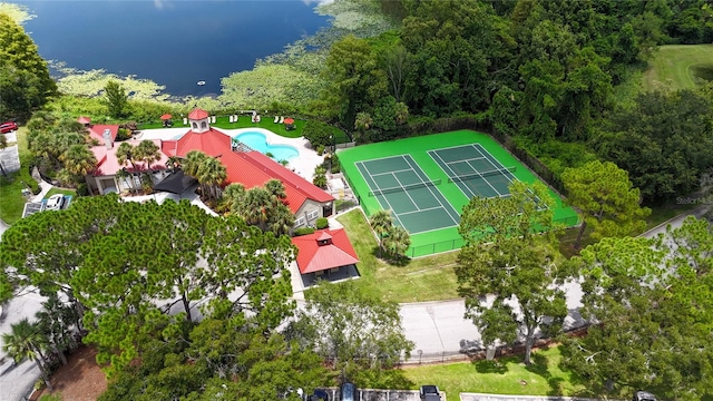 birds eye view of property with a water view