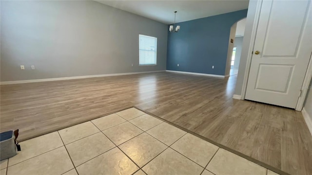 unfurnished room featuring light hardwood / wood-style floors