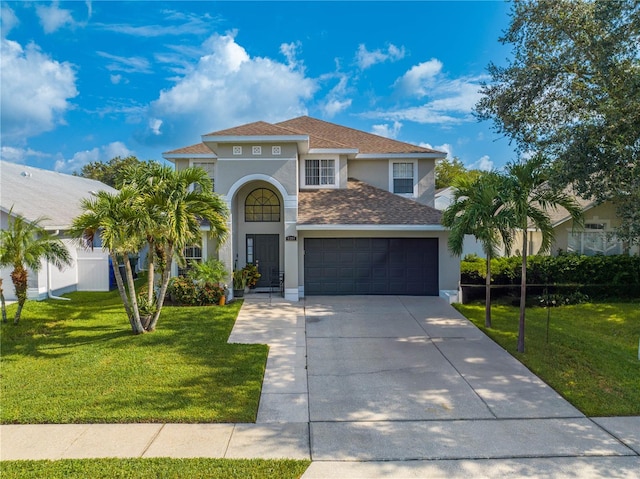 mediterranean / spanish-style house featuring a front lawn and a garage