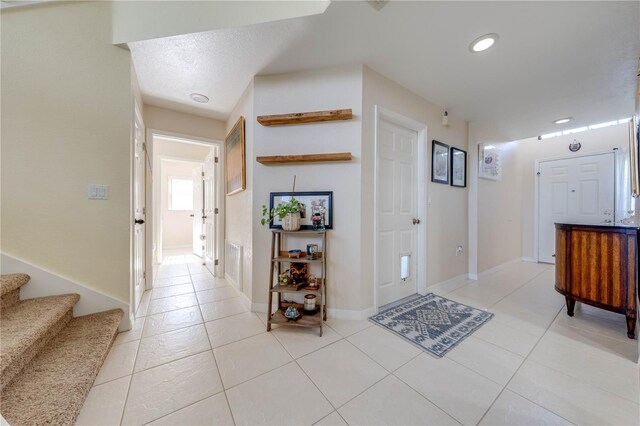 view of tiled foyer entrance