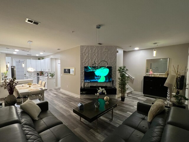 living room with hardwood / wood-style flooring