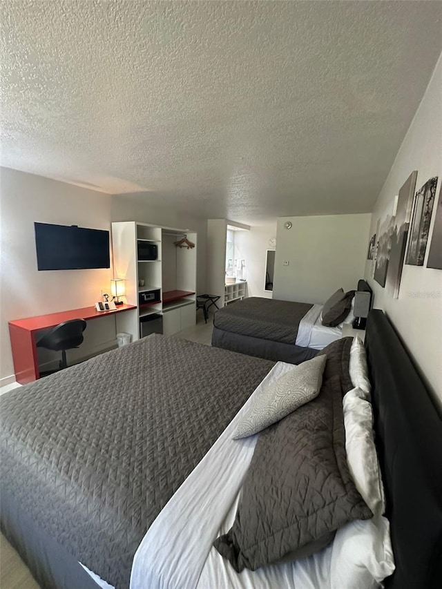 bedroom featuring a textured ceiling