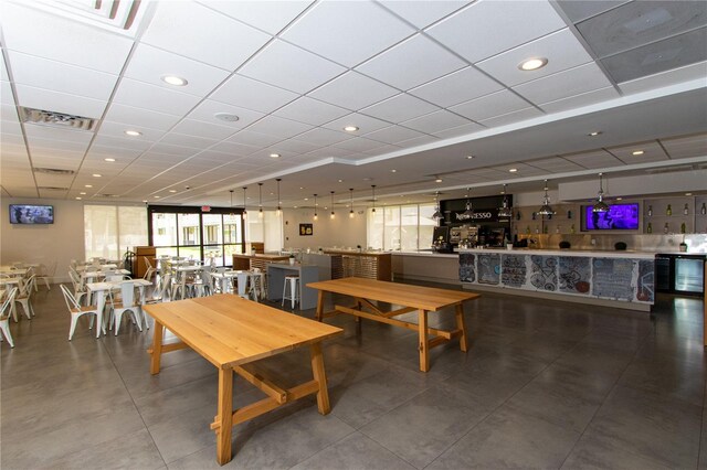 dining area with recessed lighting, visible vents, and a paneled ceiling