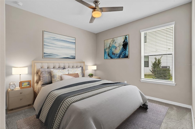 bedroom with light carpet and ceiling fan