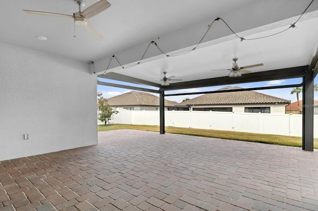 view of patio featuring ceiling fan