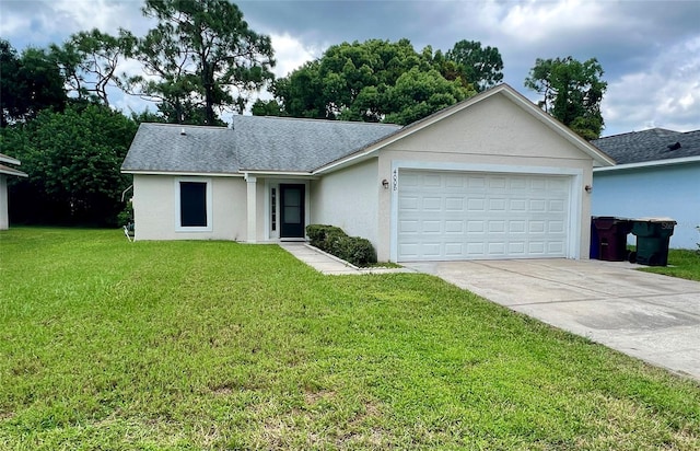 single story home featuring a garage and a front yard