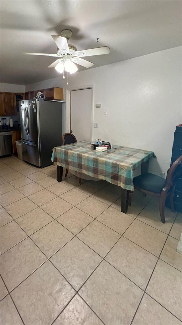 tiled dining room featuring pool table and ceiling fan