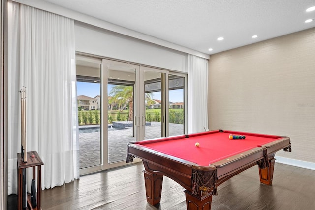 recreation room with a textured ceiling, french doors, pool table, and wood-type flooring