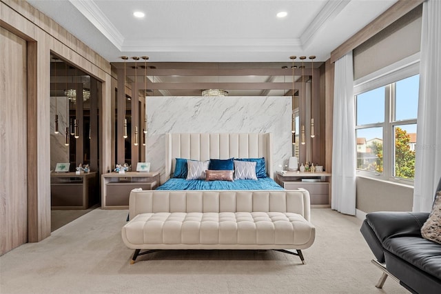 carpeted bedroom with a raised ceiling and crown molding