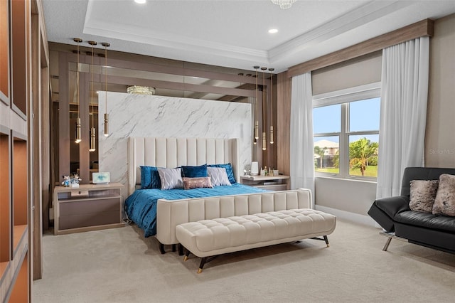 carpeted bedroom with a raised ceiling, crown molding, and a textured ceiling