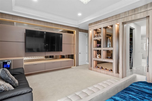 living room with built in features, ornamental molding, and carpet