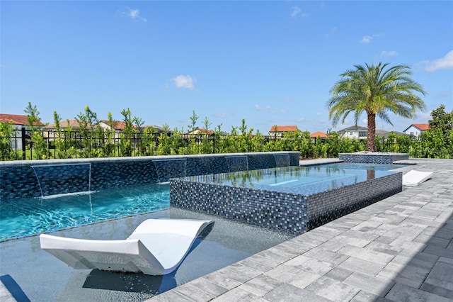 view of pool featuring pool water feature