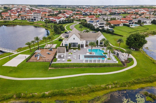 birds eye view of property featuring a water view