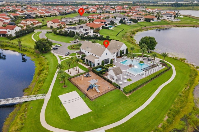 birds eye view of property featuring a water view