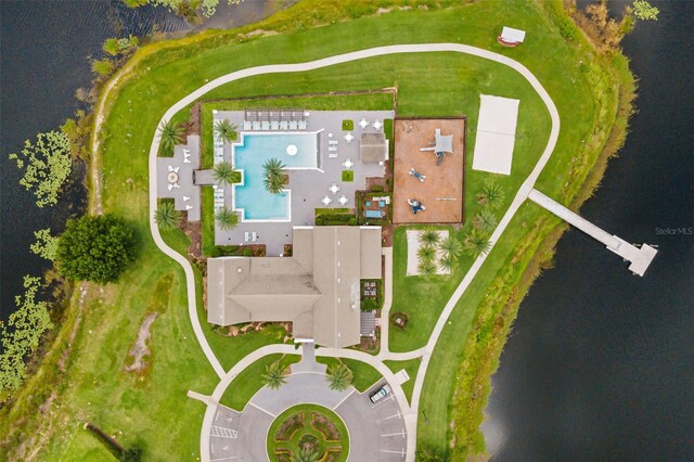 birds eye view of property featuring a water view