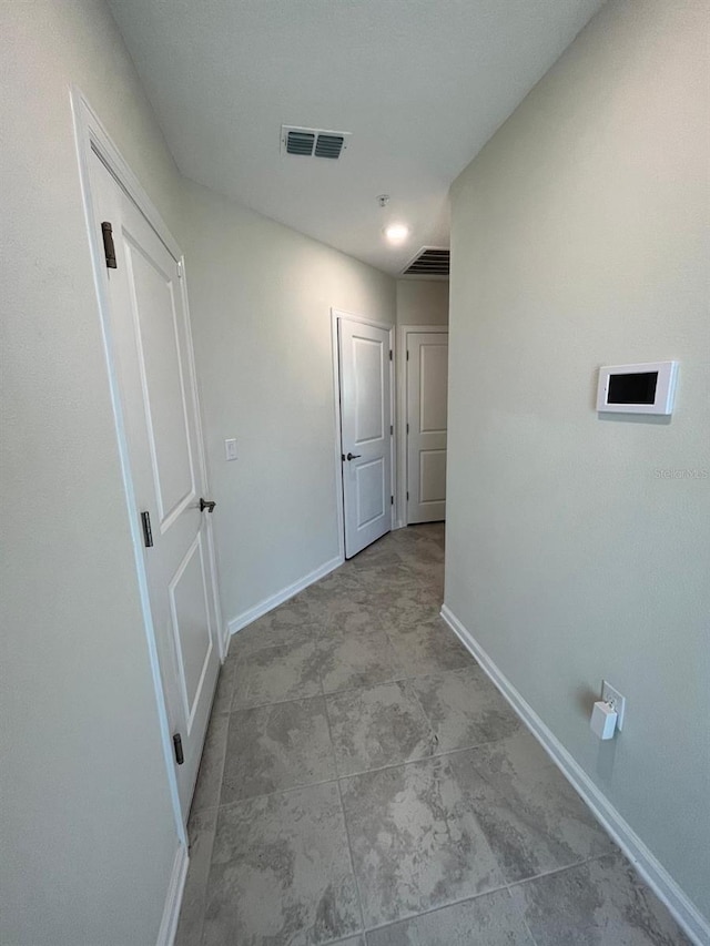 washroom featuring light tile patterned flooring