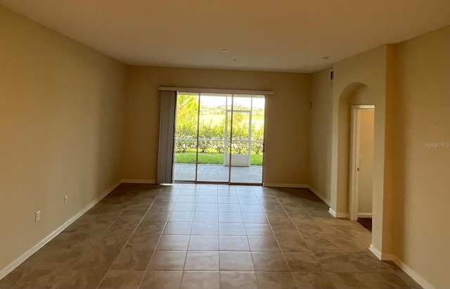 view of tiled spare room