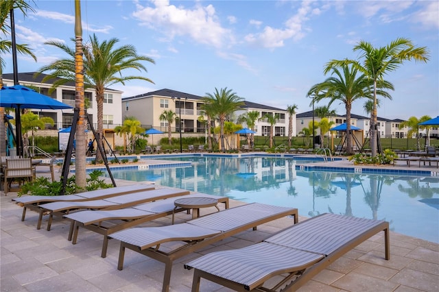 view of swimming pool featuring a patio