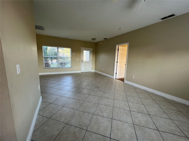 view of tiled empty room