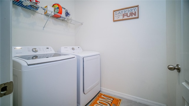 laundry room featuring independent washer and dryer