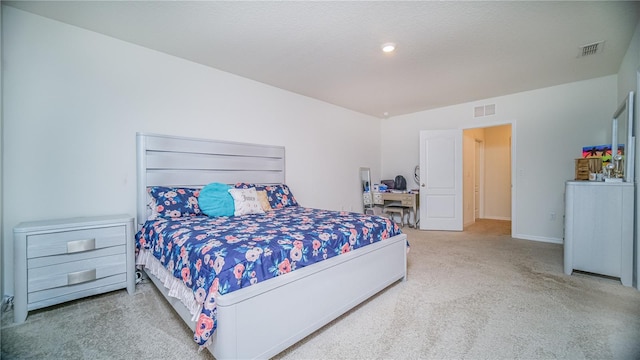 bedroom featuring carpet, visible vents, and baseboards