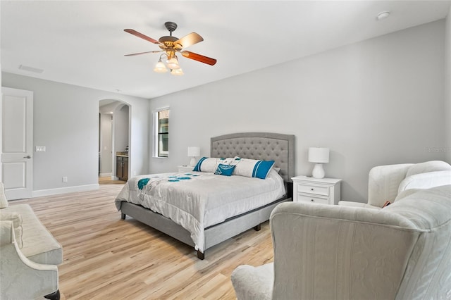 bedroom featuring ceiling fan and light hardwood / wood-style floors