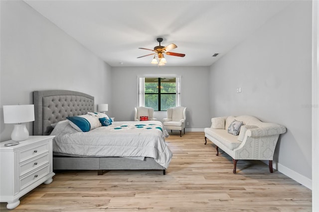 bedroom featuring ceiling fan and light hardwood / wood-style floors