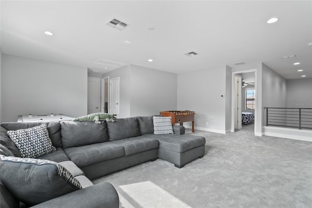 living room with baseboards, carpet, visible vents, and recessed lighting