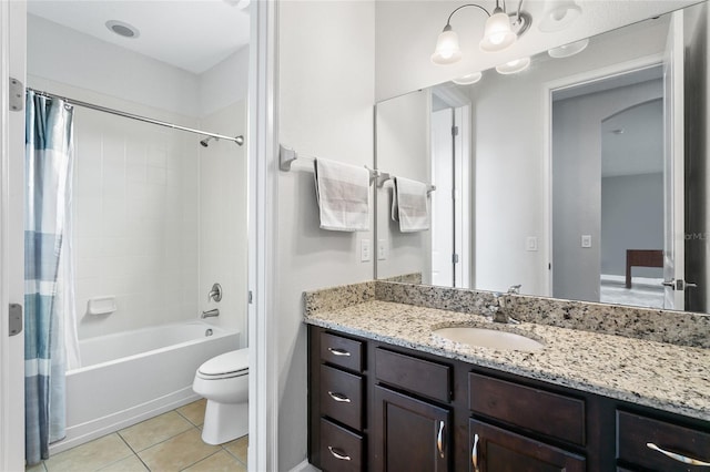 full bathroom with tile patterned flooring, toilet, vanity, and shower / bathtub combination with curtain