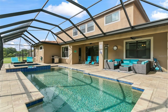 view of swimming pool with glass enclosure, a patio area, outdoor lounge area, an in ground hot tub, and ceiling fan