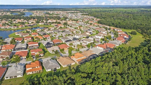 aerial view with a residential view and a water view