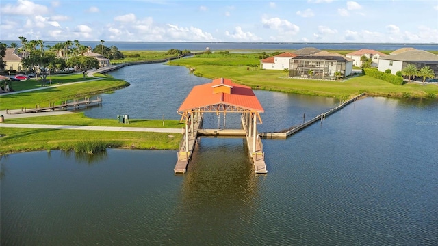 exterior space with a water view and a residential view