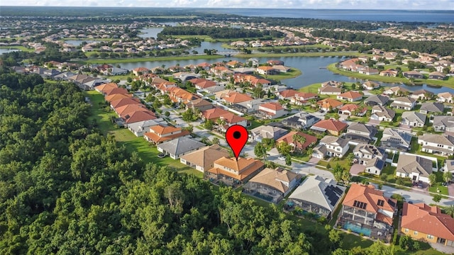 aerial view featuring a residential view and a water view