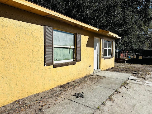 view of home's exterior with a patio area