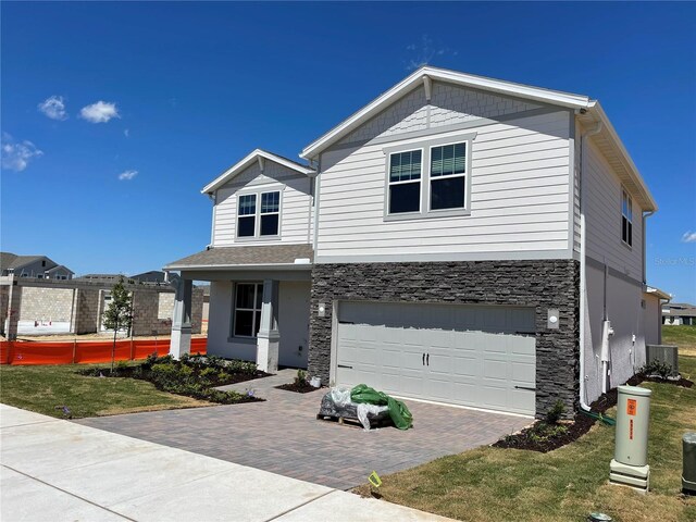 view of front of property featuring a garage