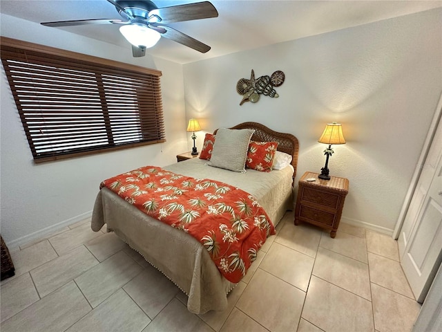 bedroom featuring ceiling fan and light tile patterned floors