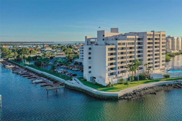 birds eye view of property with a water view