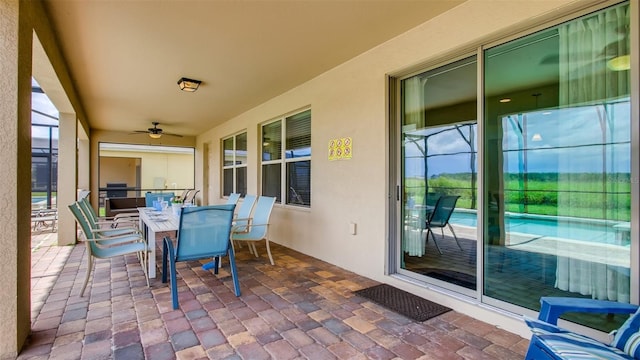 view of patio / terrace featuring ceiling fan