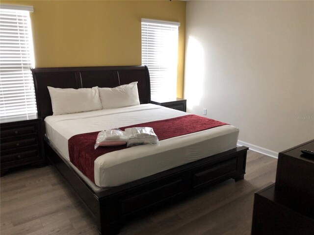 5265 Oakbourne Ave, Davenport, FL 33837 - bedroom featuring wood finished floors and baseboards