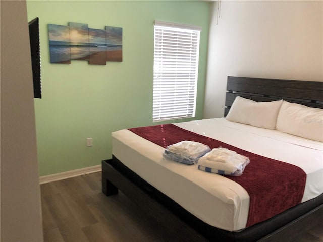 bedroom featuring wood-type flooring