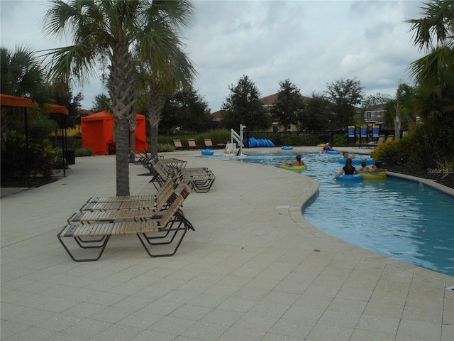 view of pool with a patio