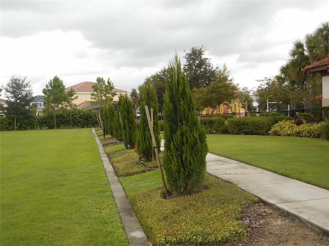 view of community featuring a lawn